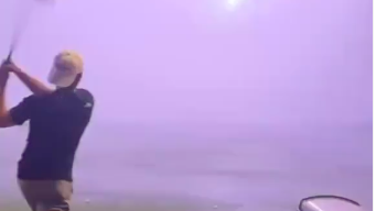 Golf fans react as airborne ball is STRUCK BY LIGHTNING at TopGolf in America!